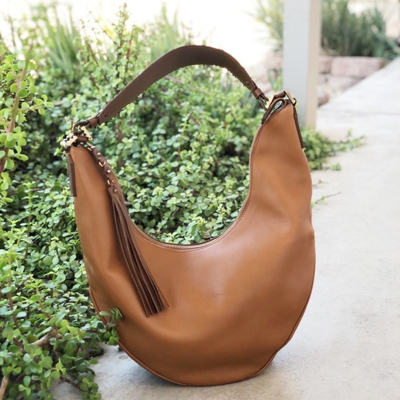 Aquatalia Handbags - Aquatalia Leather Tassle Embossed Handle Hobo Bag